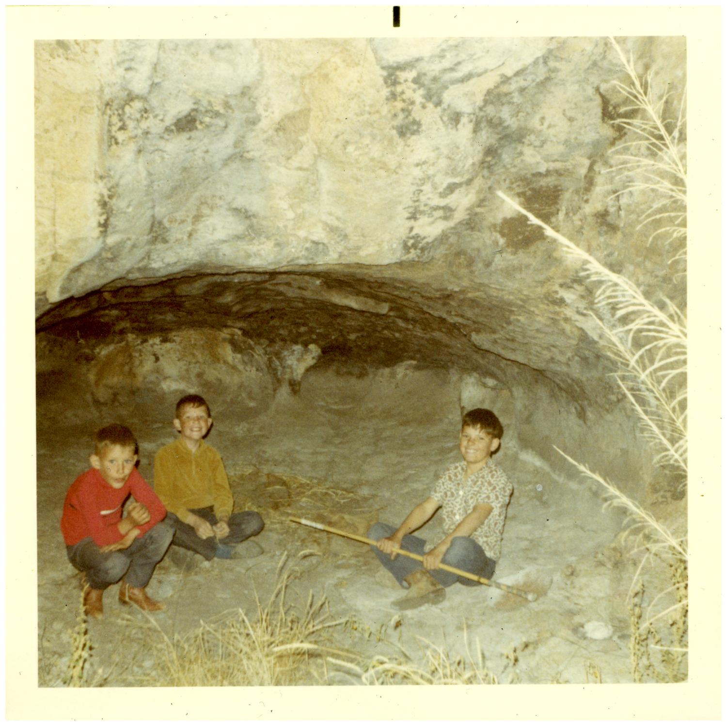 3 boys in cave